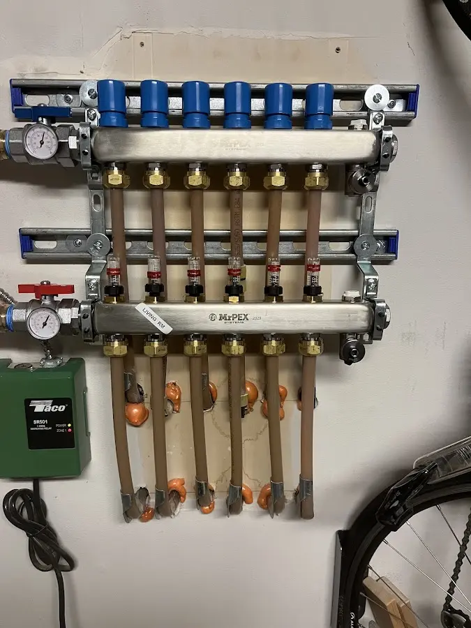 Plumber performing Water Heater Repair at a residential property in Eastmont